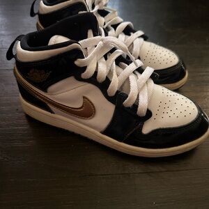 Nike Kids' Black, White, and Gold Sneakers